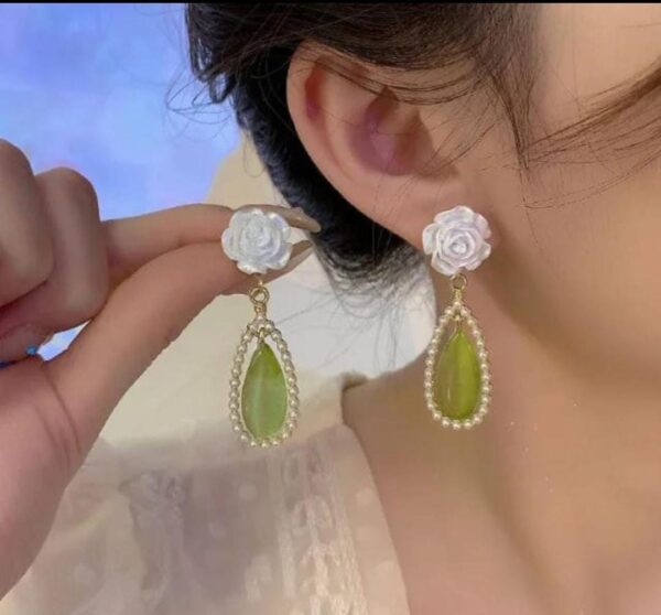 White flower with green stone long earring